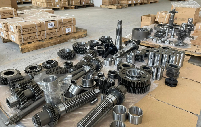 Technician servicing industrial machinery components